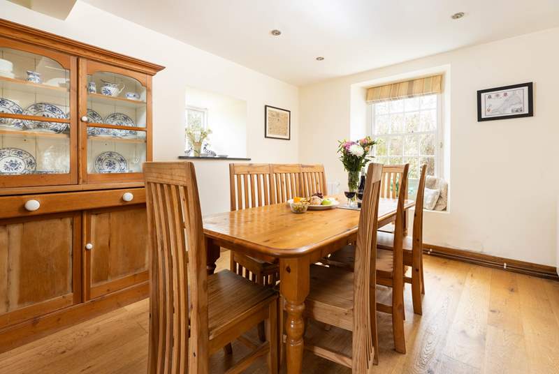 Enjoy long meals around the dining table at Higher Carnon Farmhouse. 