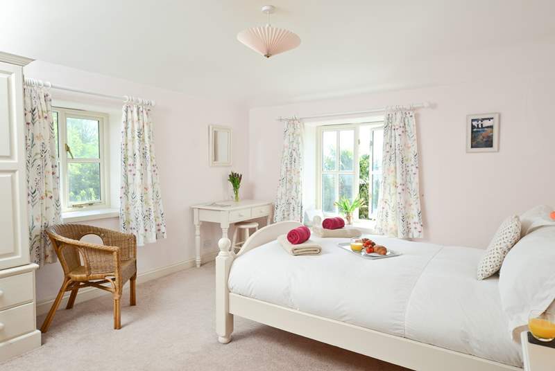 Comfortable and warm this en suite bedroom boasts fabulous views too.