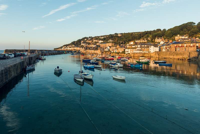 Mousehole Harbour is just three miles away.