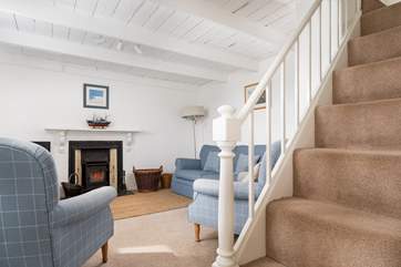 The cosy sitting-room with its traditional beamed ceiling.