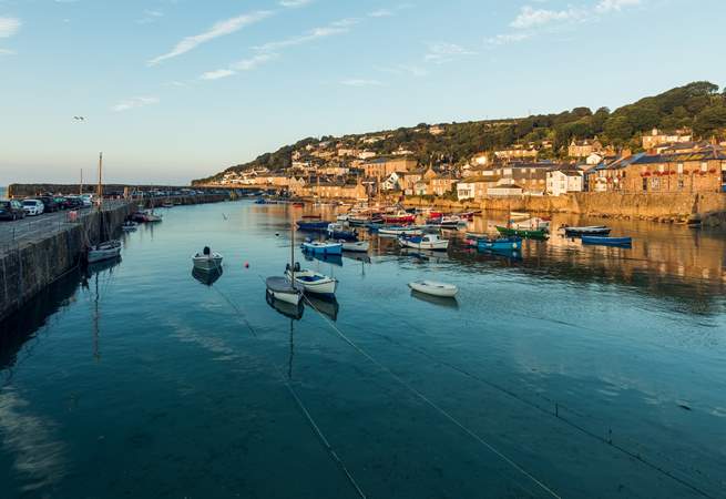 Mousehole Harbour is just three miles distant.