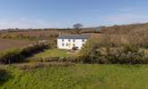 An aerial view of the cottage, showing its tranquil rural location once part of a working farm. - Thumbnail Image