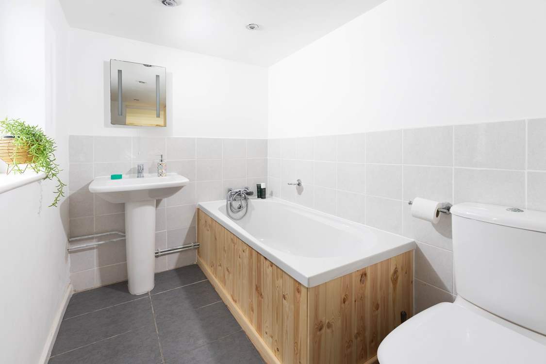 The family bathroom located downstairs.