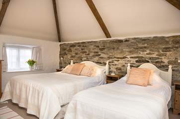 Dual-aspect bedroom 5 has a king-size double and a single bed.