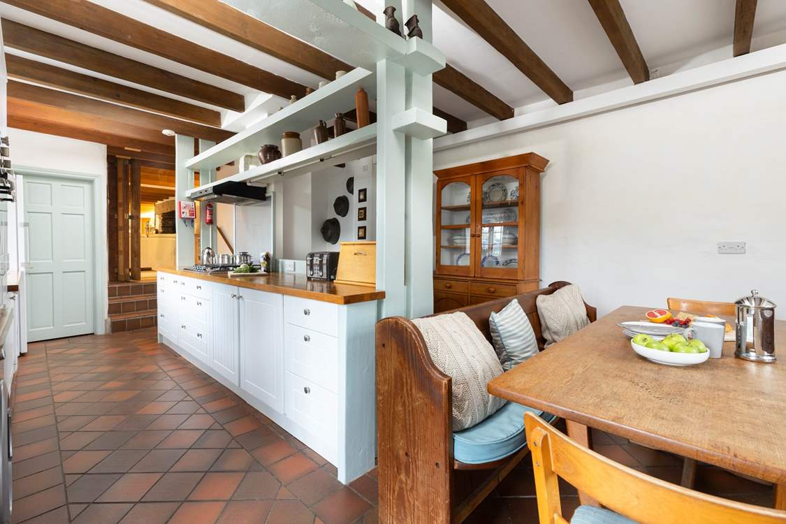 The lovely kitchen is the perfect spot for a family gathering.