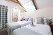 The pretty blue bedroom has an en suite shower-room (Bedroom 4).