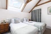 A light and airy room with a Velux window.