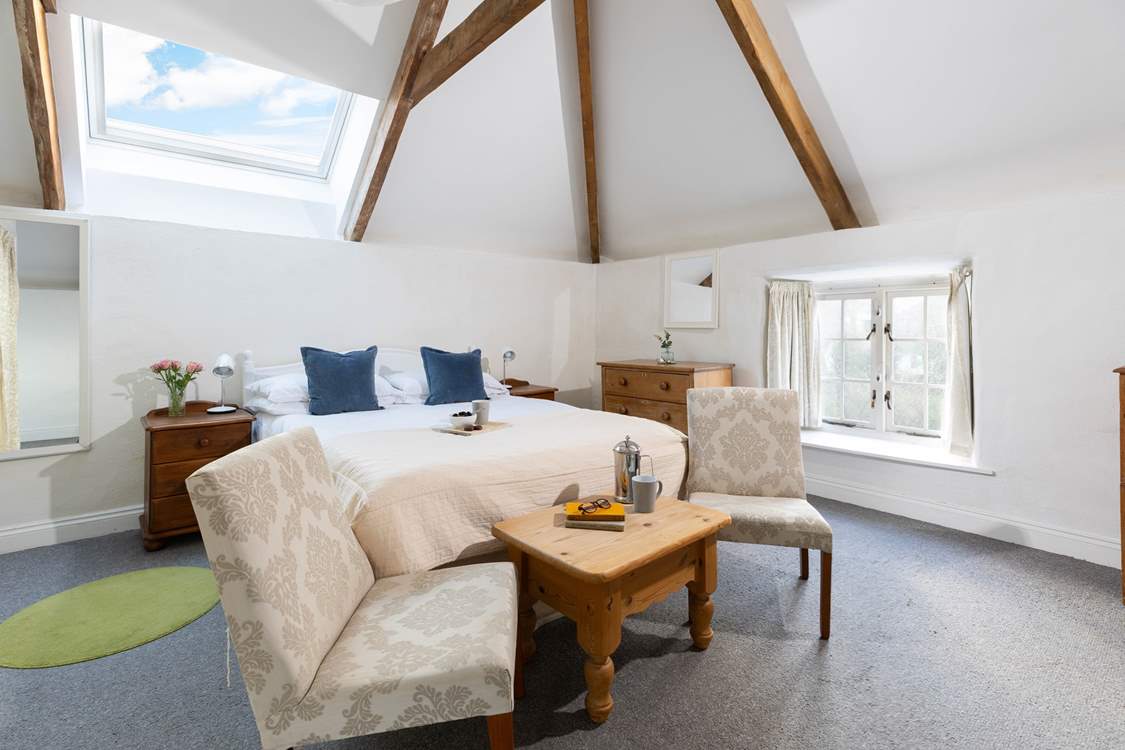 This large bedroom is so light and airy.