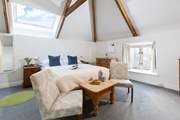 This large bedroom is so light and airy.