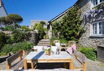 Steps lead to the front door. 