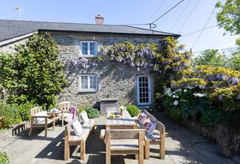 Enjoy long relaxing meals in the suntrap of a garden. 