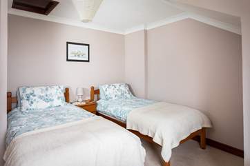 Bedroom 2 has twin beds.