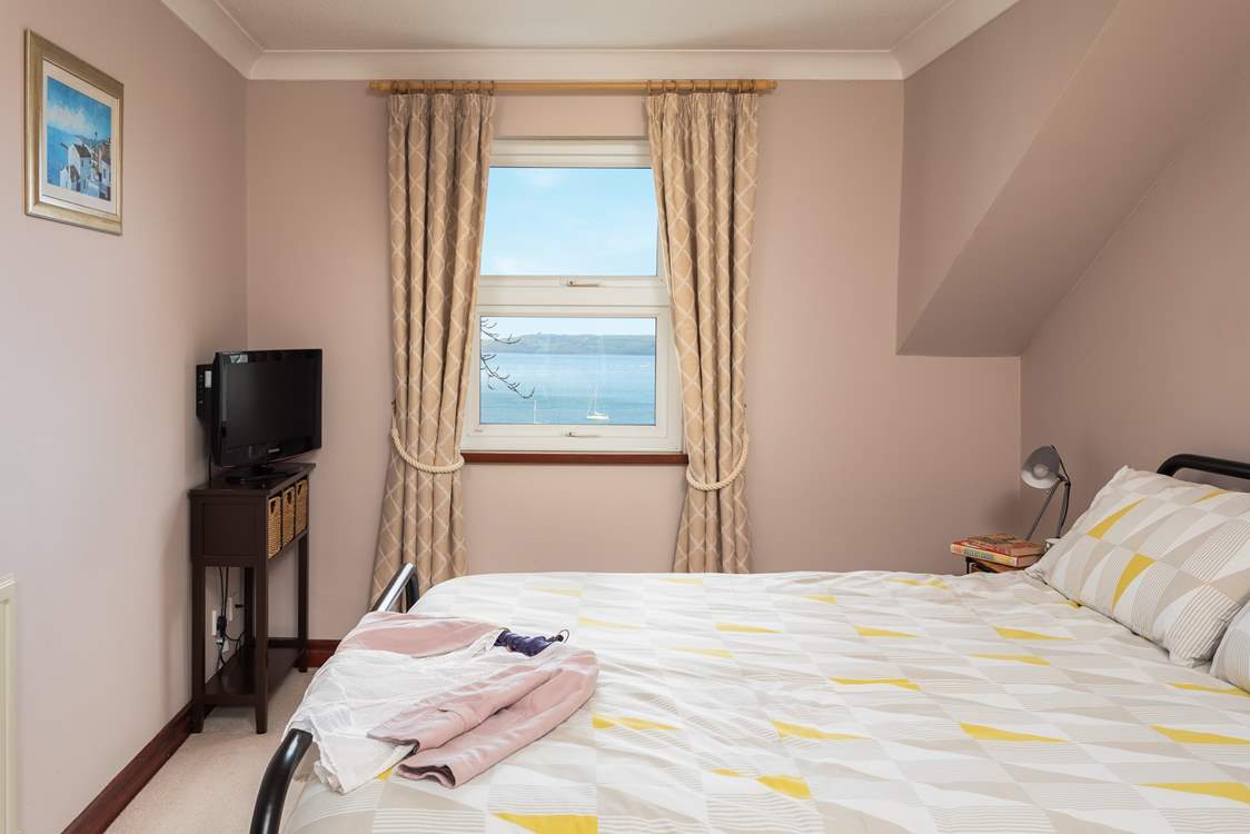 Bedroom 1 has a king-size (5') bed, small television and DVD player.