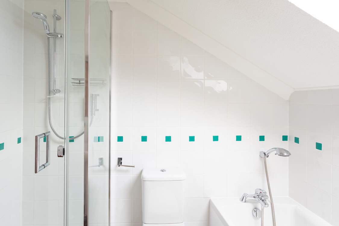 There is a separate shower cubicle in the bathroom.