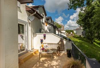 Enjoy a morning coffee tucked away in this sheltered spot. 