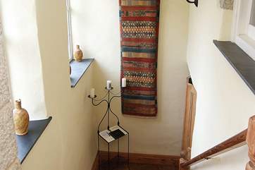 The view from the top of the stairs down to the entrance hall.