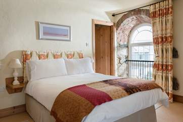 The double bedroom (Bedroom 1) has an en suite shower-room.