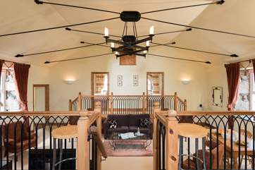 The high ceilings and wonderful light fitting, add to the feeling of space in this amazing cottage.