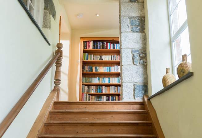 The wide staircase leading up to the apartment has a cosy window seat at the top, an ideal spot for quiet contemplation, or reading a good book.