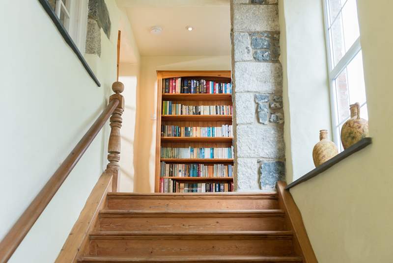 The wide staircase leading up to the apartment has a cosy window seat at the top, an ideal spot for quiet contemplation, or reading a good book.