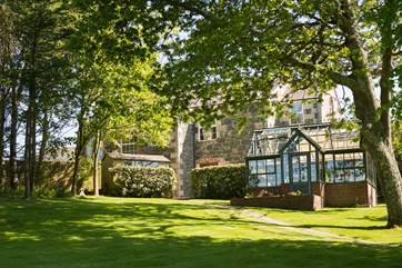 Looking back at The Old Chapel and the summer house from the paddock.