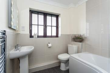 This bathroom is lovely and light.