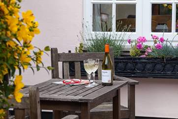 There is a private courtyard at the front of the house.