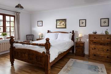 The master bedroom has a king-size bed, dressing-area and en suite shower-room (Bedroom 1).