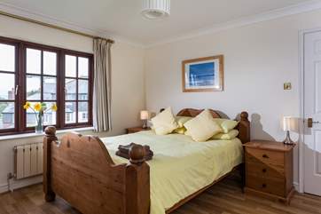 This bedroom has a king-size bed and lovely views over the marina (Bedroom 2).