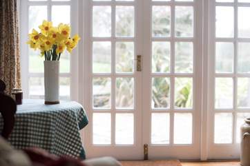 French doors open out to the patio and garden.