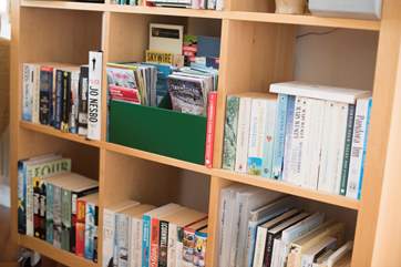 Plenty of books and maps for guests to use.
