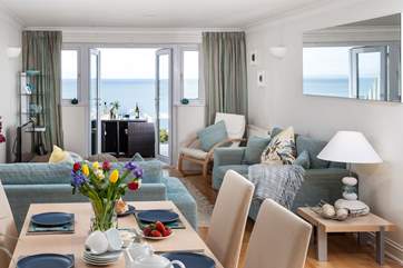 The fabulous open plan living-area, with sea views.