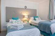 The pretty twin bedroom.