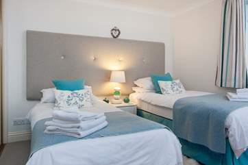 The pretty twin bedroom.