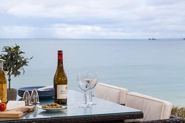The balcony is the perfect spot to watch the world sail by.