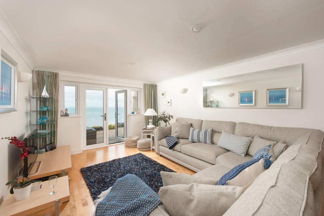 The fabulous open plan living-area, with sea views.