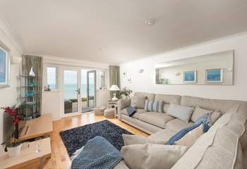 The fabulous open plan living-area, with sea views.