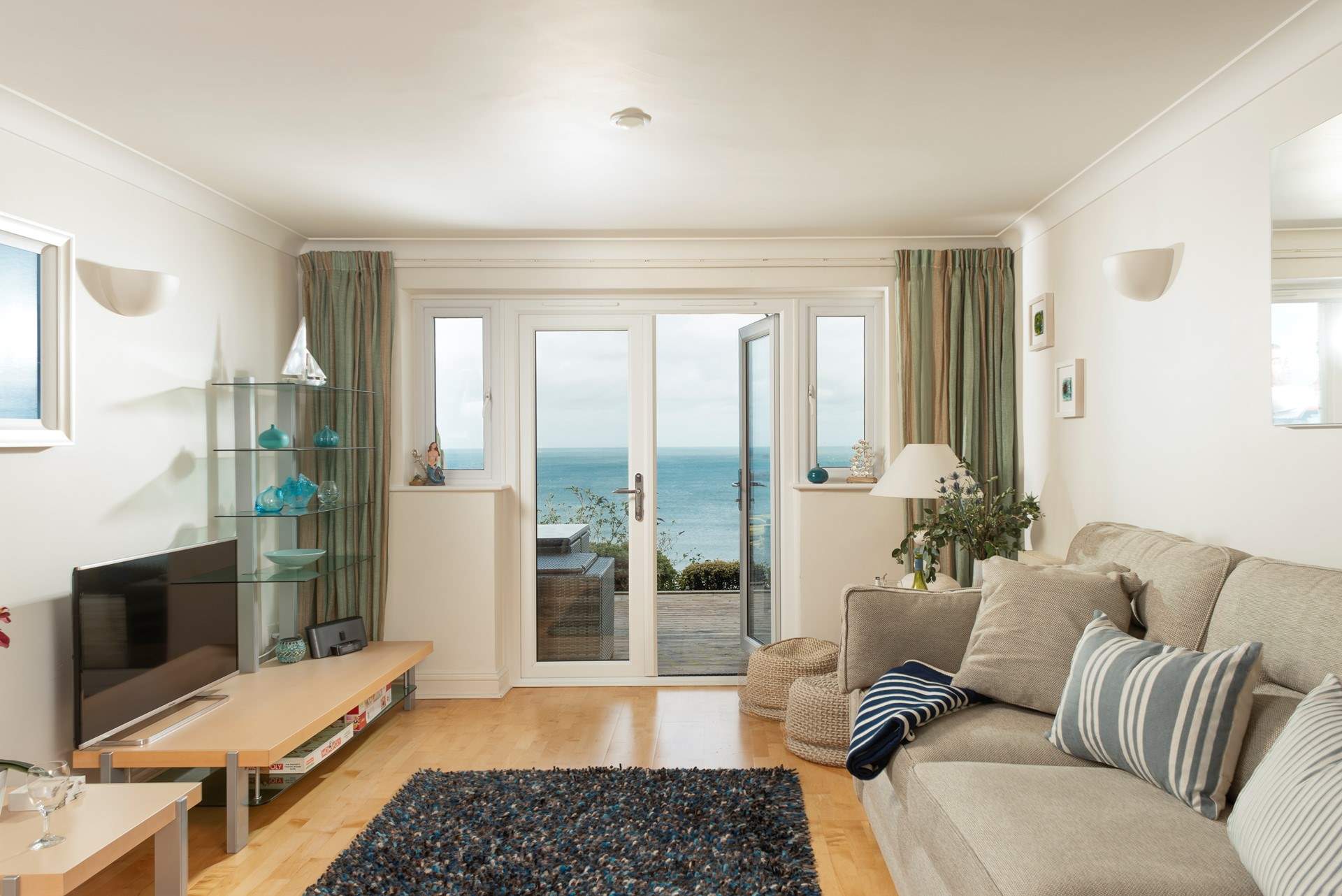 Relax and recline whilst gazing out to the azure blue sea beyond.