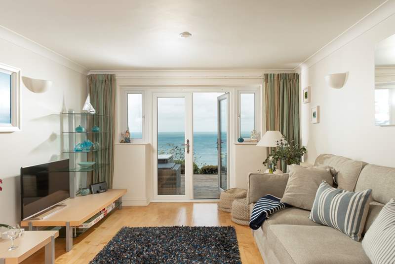 Relax and recline whilst gazing out to the azure blue sea beyond.