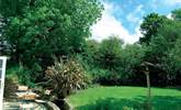 The garden is a sun-trap and ideal for al fresco dining. - Thumbnail Image