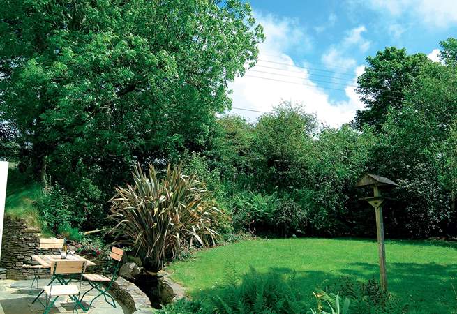 The garden is a sun-trap and ideal for al fresco dining.