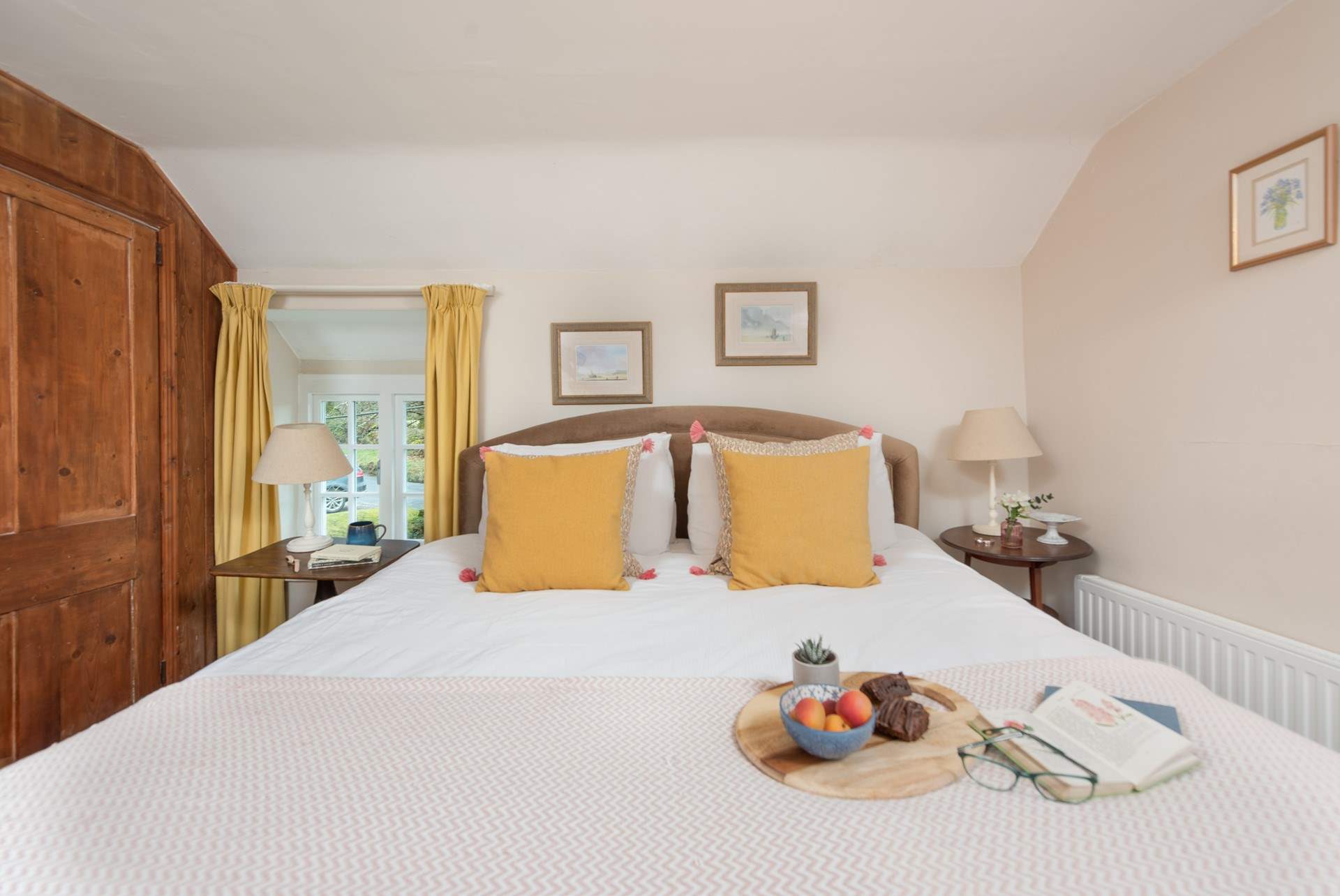 The cottage has two pretty bedrooms.