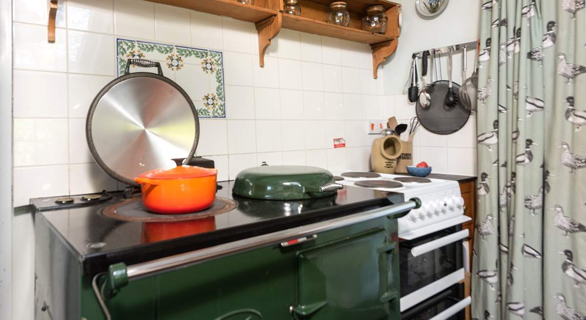 The lovely electric Aga creating a warm welcome all year round and there is an electric oven and hob too. 