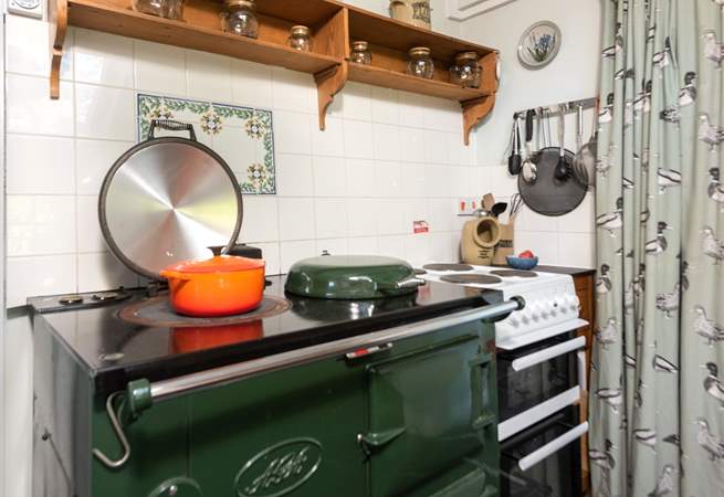 The lovely electric Aga creating a warm welcome all year round and there is an electric oven and hob too. 