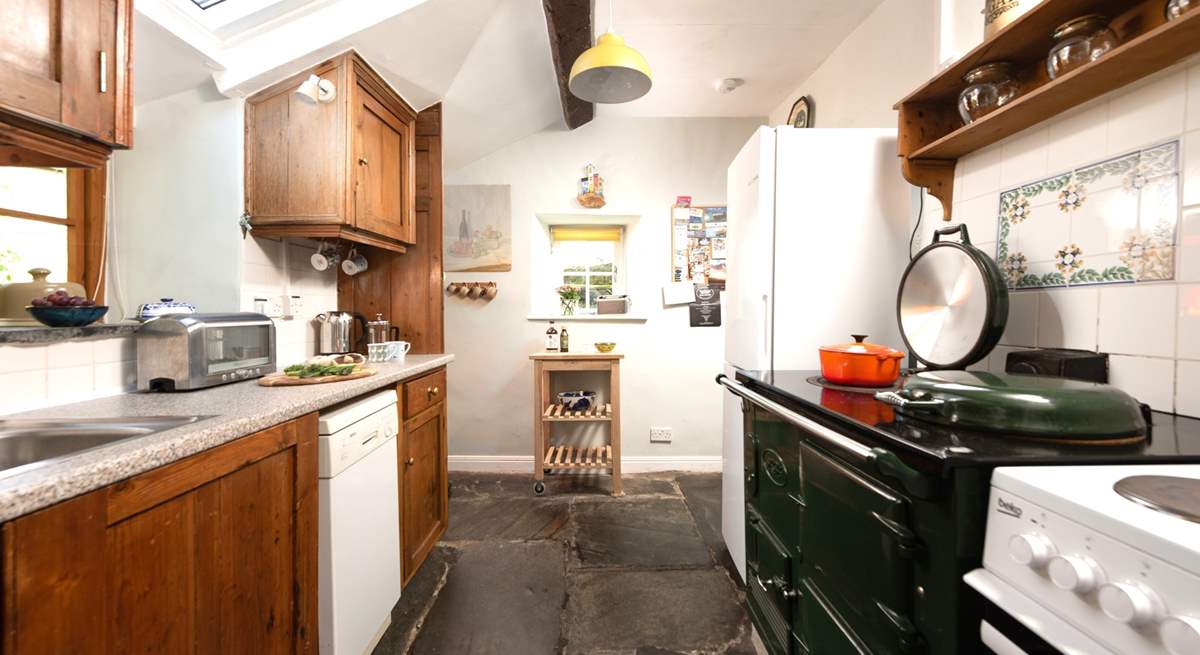 Exposed beams and original flagstone floors add to the charm and character of Chy Goff.