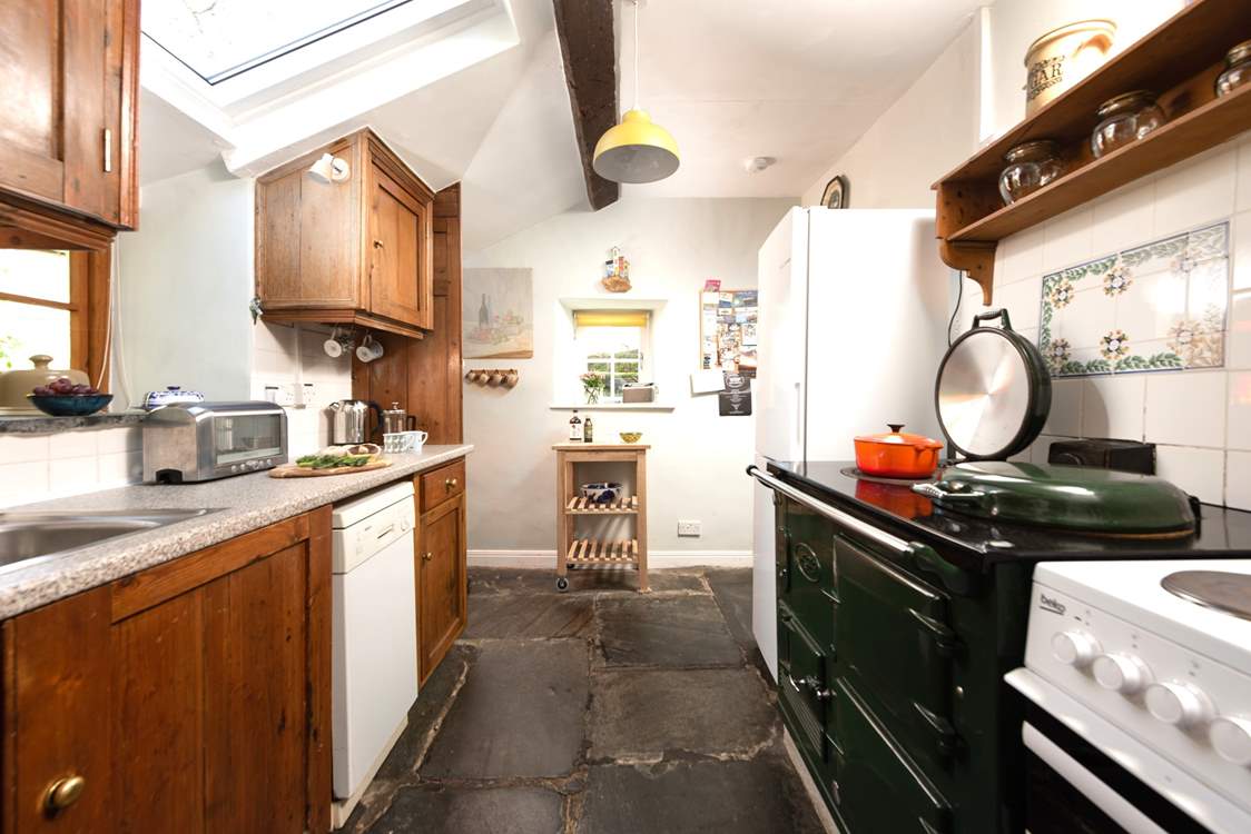 Exposed beams and original flagstone floors add to the charm and character of Chy Goff.