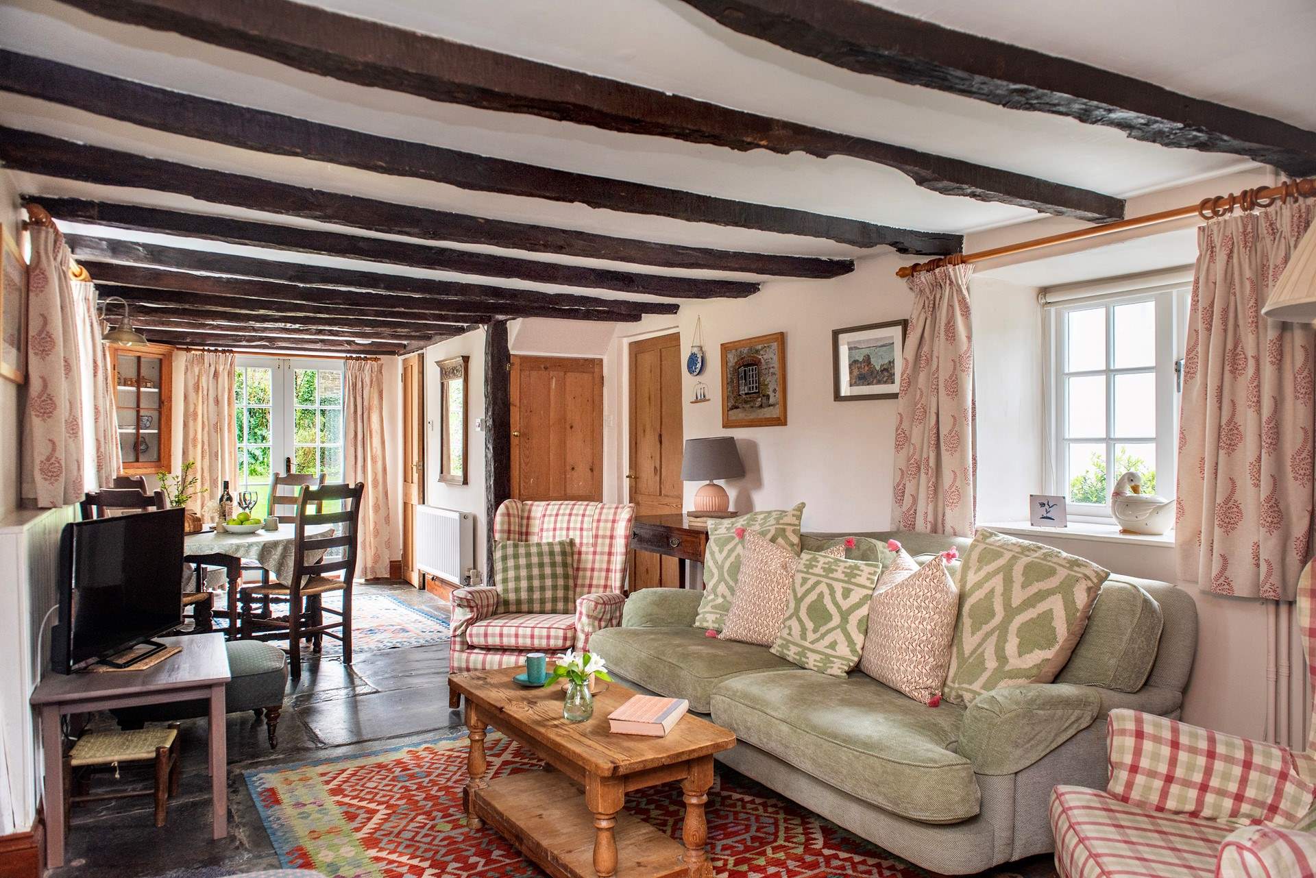 Step into the the open plan living and dining room, it's as cosy as can be.