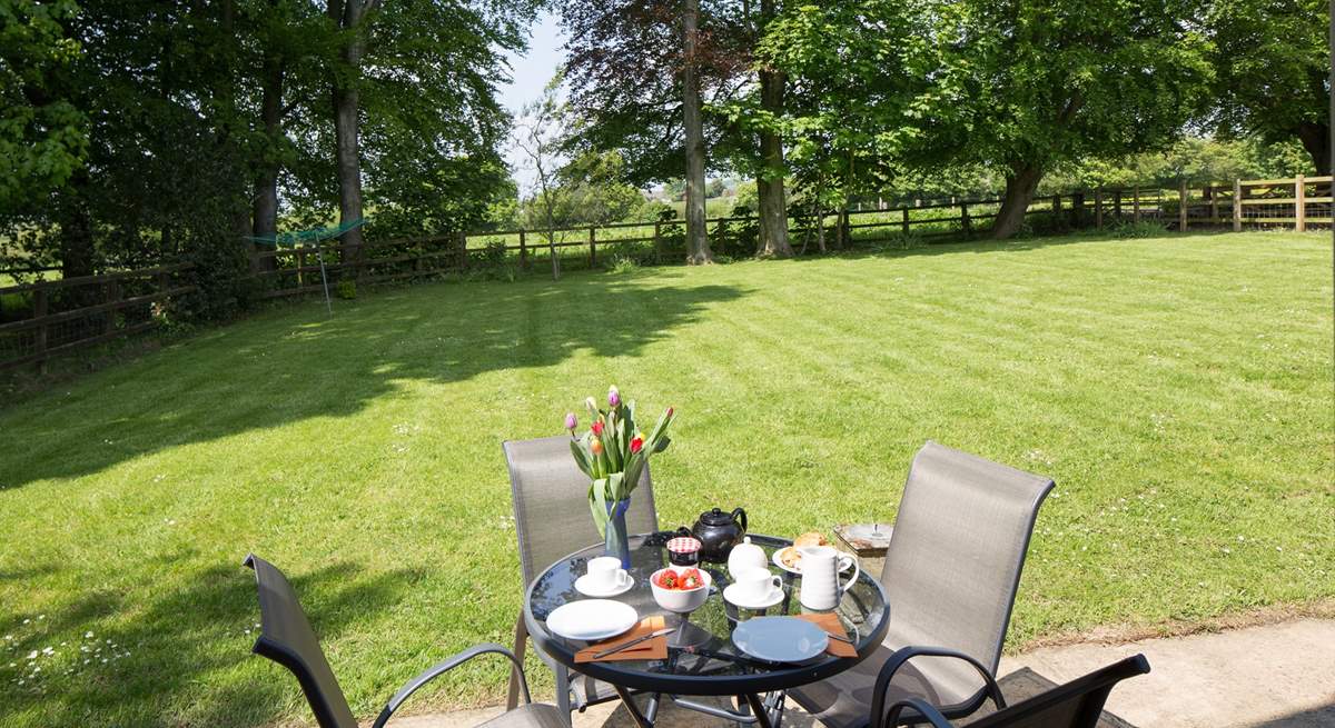 The fully enclosed garden looks out over the rolling Dorset countryside.