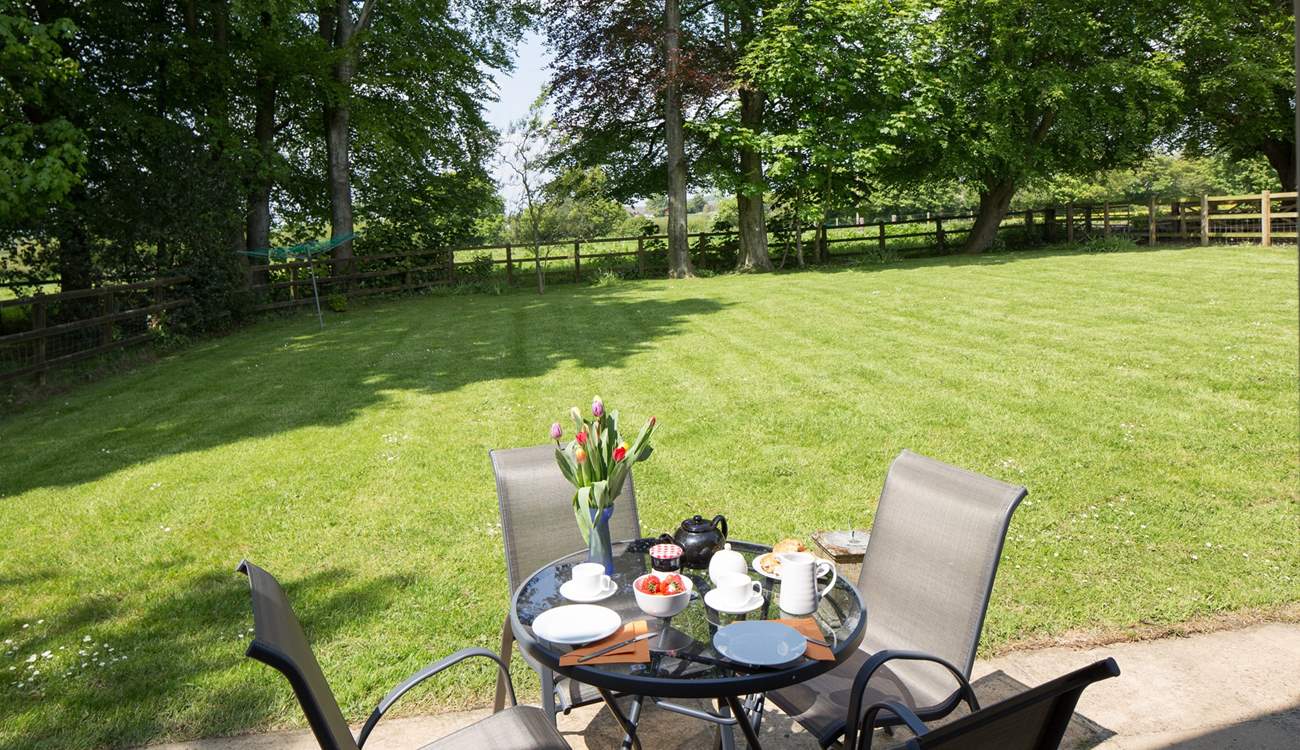 The fully enclosed garden looks out over the rolling Dorset countryside.