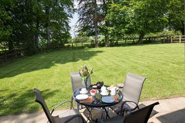 The fully enclosed garden looks out over the rolling Dorset countryside.